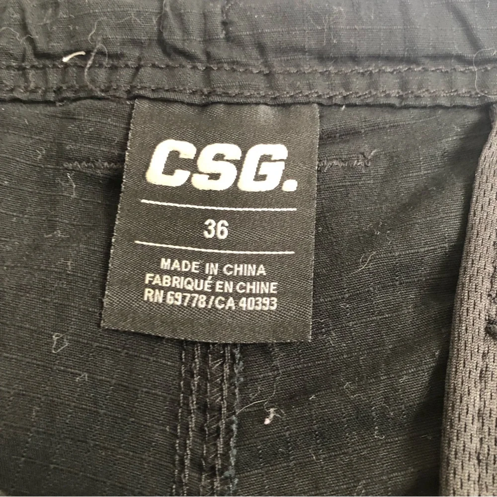 CSG. Pockets in back and front zipper up size 36 shorts